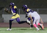 Lemoore's Treven Gaffney runs into the endzone for a touchdown after a blocked punt by Kiontre Harris.